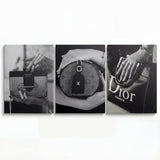 Modern wall art with black-and-white photos of luxury Prada, Louis Vuitton and Dior handbags