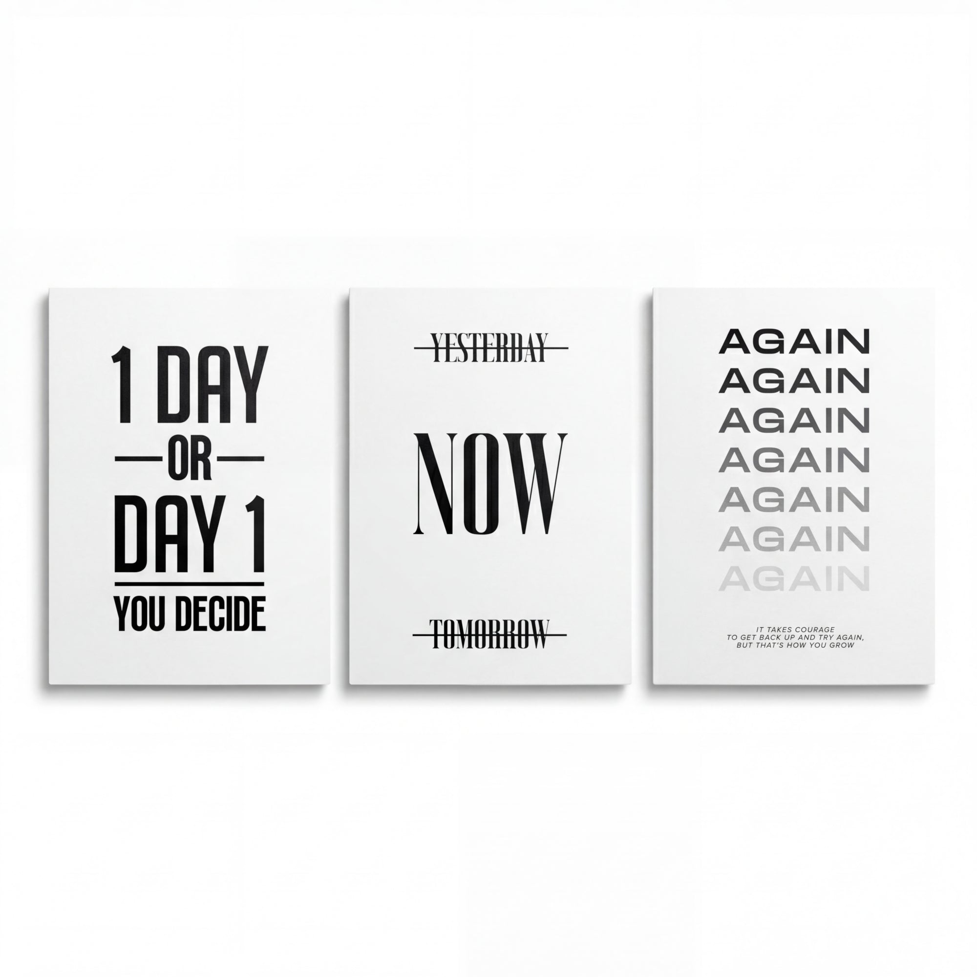 Motivational canvas wall art set with three black-and-white minimalist prints reading “1 Day or Day 1”, “Now” and “Again”