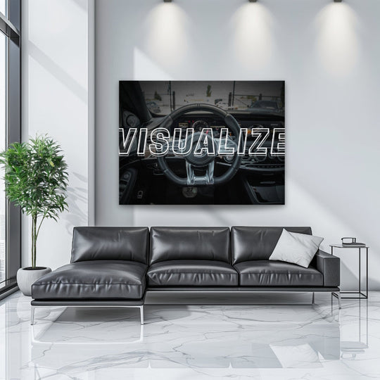 Motivational canvas wall art with a luxury car interior and VISUALIZE text in a modern living room.